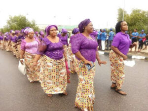 Women In Aso Ebi awaits the Akwa Ibom PDP Chairman At The Airport after Makarfi's victory