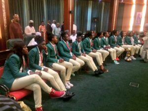 Array of D'Tigress team seated, listening to President Buhari 