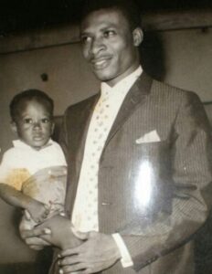 Oba Idowu Oniru with one of his children