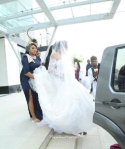 Nabila ushered in to the wedding venue by her maid-of -honour -dailyfamily.ng