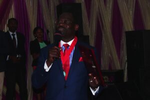 Pastor Mike Adebamowo speaking to his congregation about the award -dailyfamily.ng