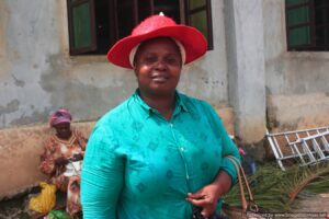 Elderly woman rejoice after receiving Christmas cloth