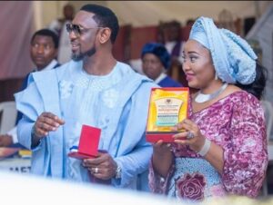 Reverend Biodun Fayotinbo and wife, Modele Fatoyinbo receiving an award
