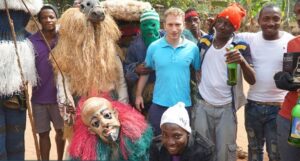 Alexander Buds in Anambra state, having fun with friends during masquerades parade