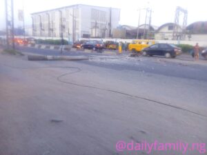 Danger as Electric Pole Falls on Ikeja Road (Photos).dailyfamily.ng