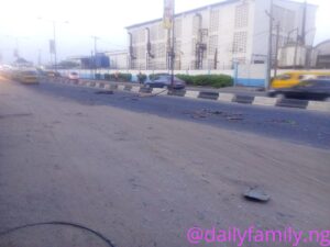 Danger as Electric Pole Falls on Ikeja Road (Photos)2.dailyfamily.ng
