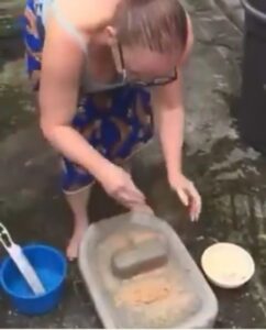 Oyinbo Woman Grinds Pepper On Stone3.dailyfamily.ng