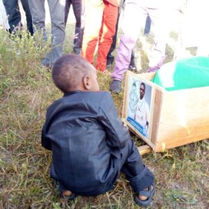 Little Boy Stares At His Father’s Obituary3.dailyfamily.ng