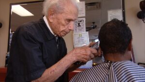 Amazing! See 107-year-old barber who has been in the profession for 96 years-dailyfamily.ng