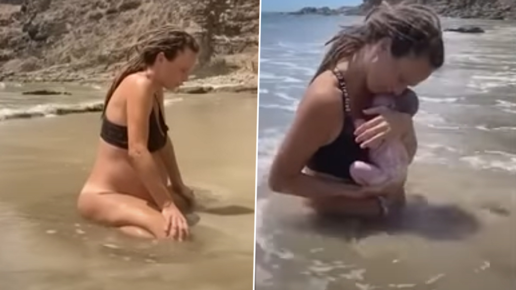Mother gives birth to her child in the Ocean